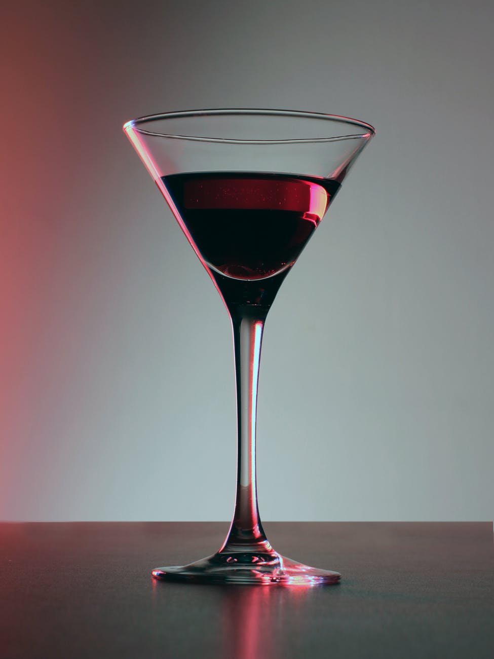 clear martini glass with wine